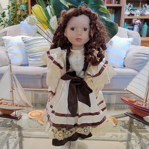 Elegant Brown and Cream Doll